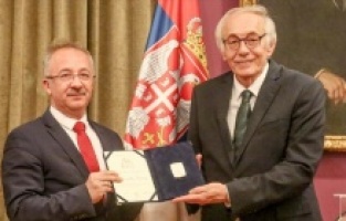 Sırbistan’dan, Cumhurbaşkanlığı Devlet Arşivleri Başkanı Ünal’a plaket